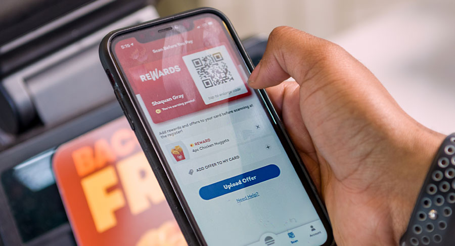 Person ordering food on their smart phone.