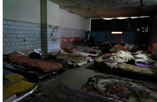 Leeza, age 10, and her mother Leena, waiting aboard a bus to be evacuated from the besieged city of Mykolaiv on March 10.