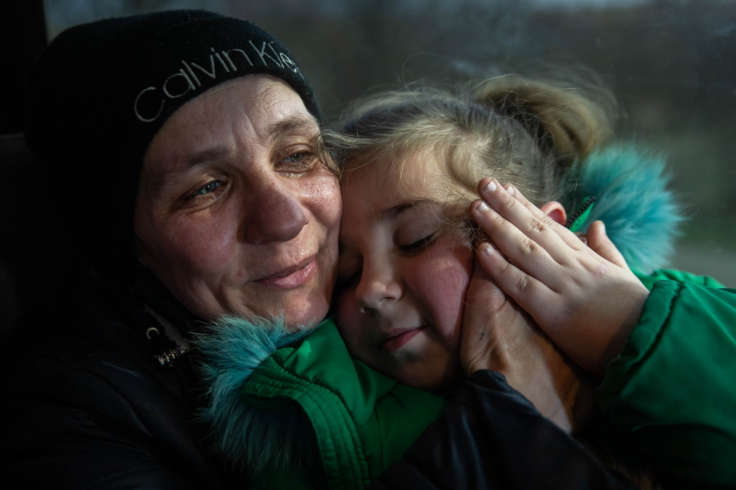 Leeza, age 10, and her mother Leena, waiting aboard a bus to be evacuated from the besieged city of Mykolaiv on March 10.