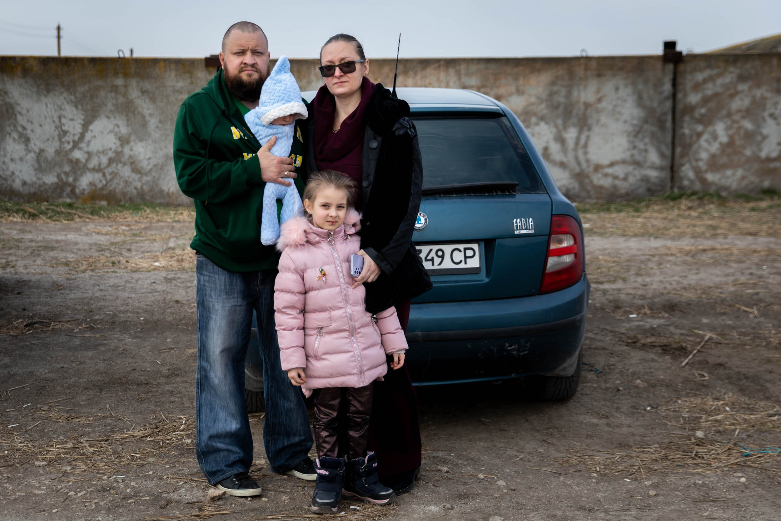 A family fleeing Kherson on their way to find refuge in Italy.