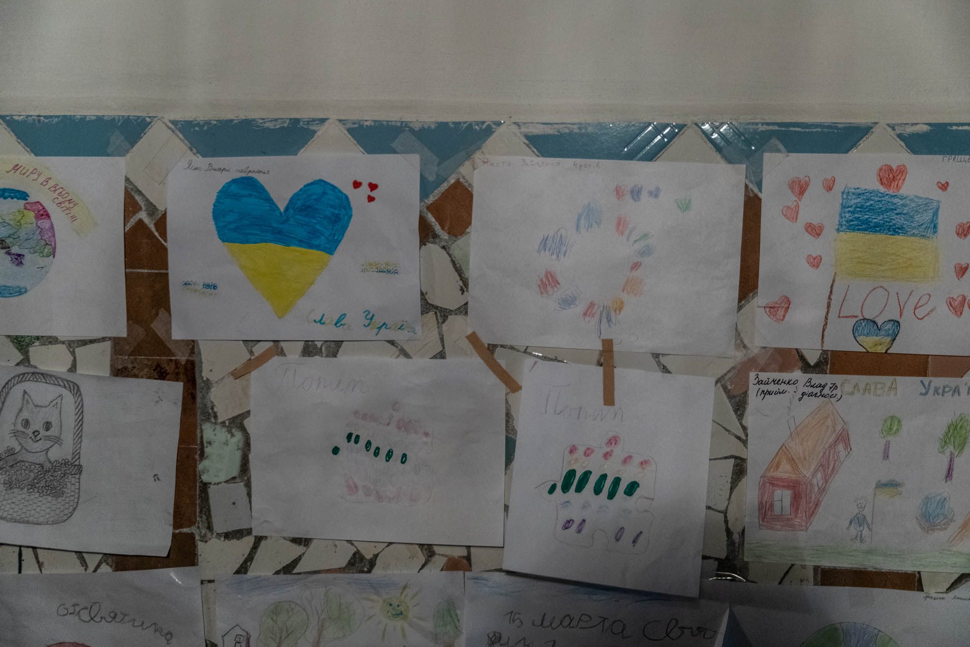 Drawings by patients line the basement walls of a hospital in Chernihiv. 