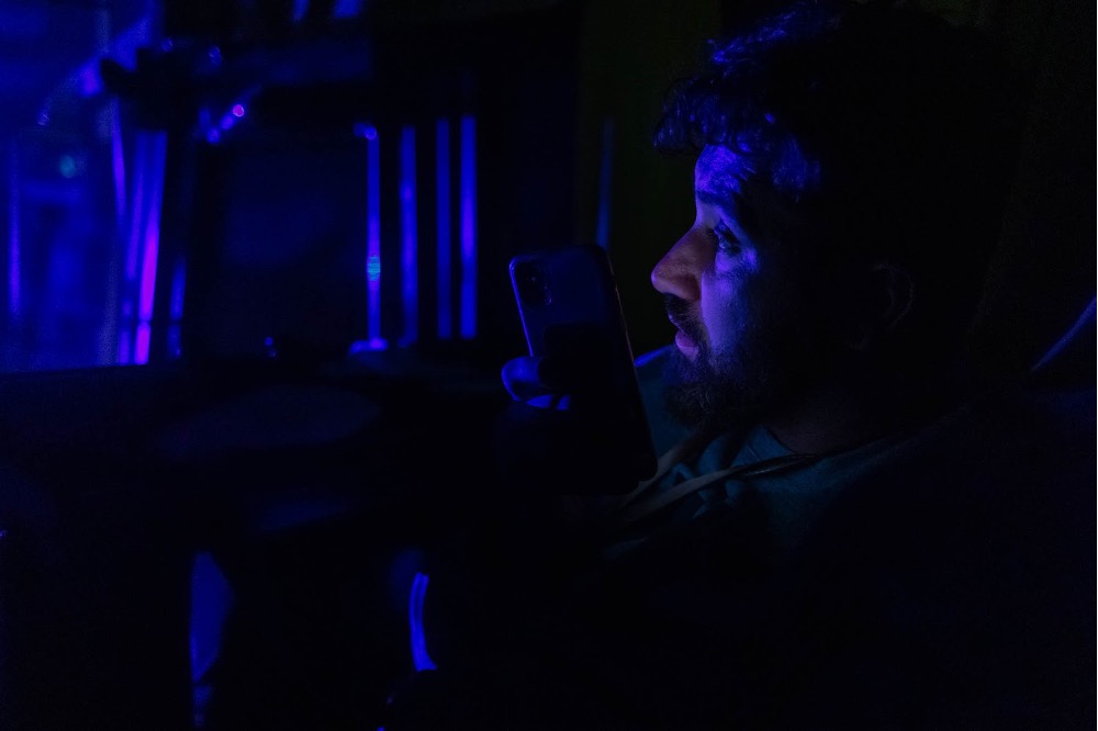 Salam coordinates with shelters in Chisinau while on an evacuation bus en route back from Mykolaiv, Ukraine.