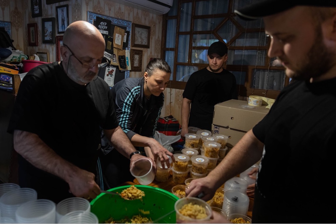Chef Gella prepares meals at Griffel Cafe in Mykolaiv, Ukraine.