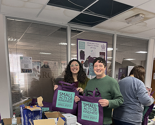 Ipsos photo of volunteers packing the Warm in Winter and Bags of Kindness bags for the charity Small Acts of Kindness