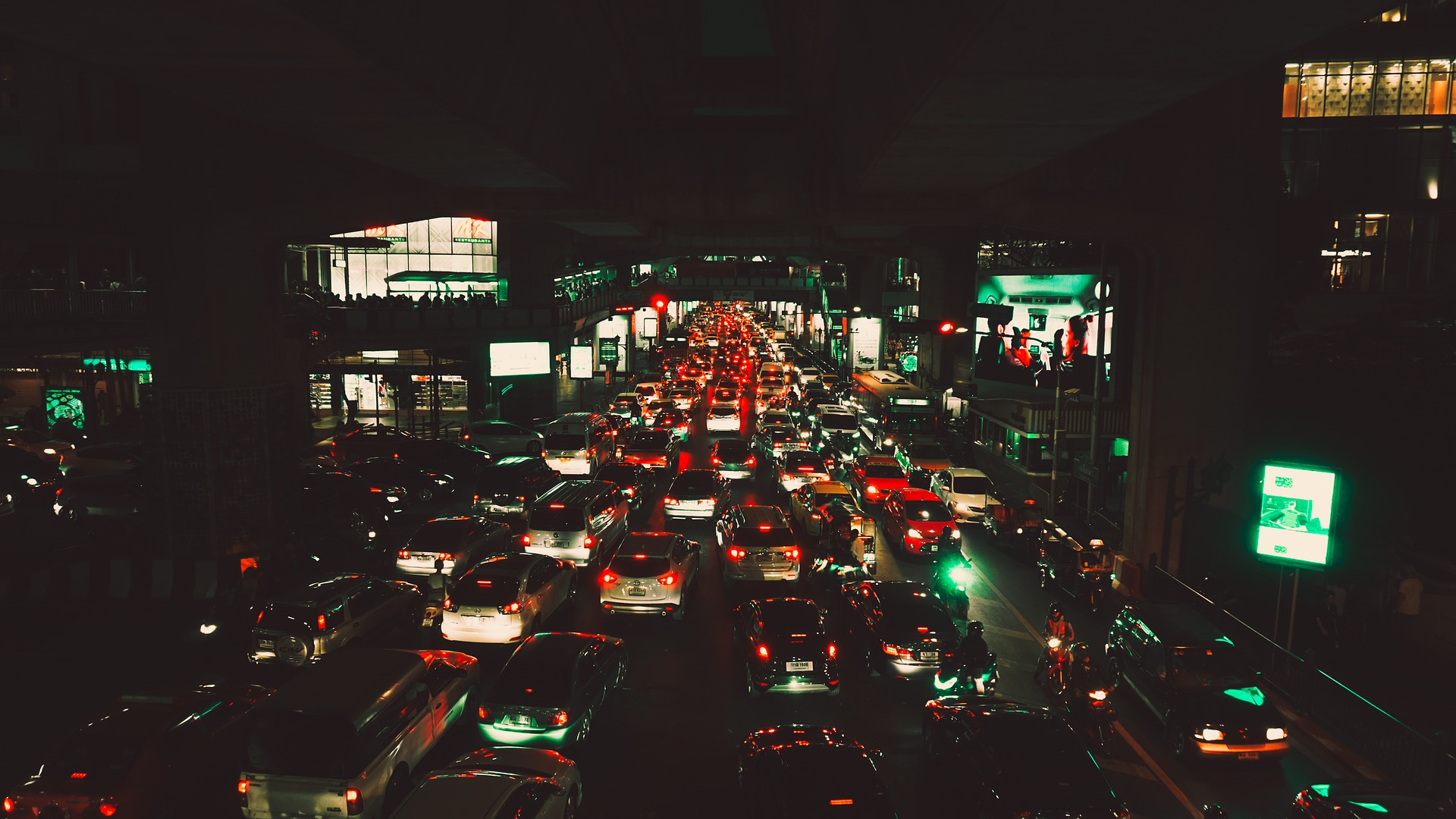 High angle photo of a traffic jam in downtown Bangkok at night