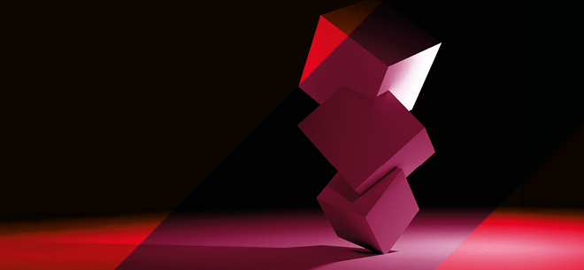 3 boxes resting one atop another to suggest a challenging undertaking