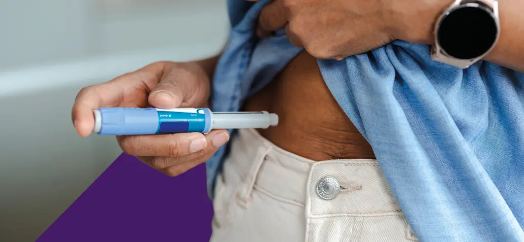 person self-administering a GLP-1 weightloss injection