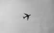 Plane silhouette in the sky