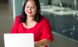 Middle-aged woman at computer