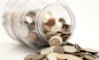 Image of jar of spilled coins