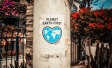Image of Poster on Concrete Wall which reads: Planet Earth First