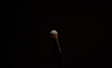 Microphone against dark background