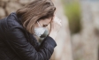 woman stressed in face mask