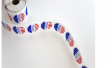 Image of roll of US "voted" stickers.
