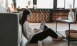 Person sitting on floor with laptop 