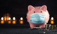 Piggy bank wearing a face mask