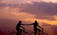 couple riding bicycle