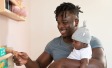 man-carrying-his-baby
