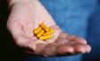 man-medication-in-palm