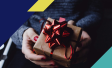 Image of hands holding a small present