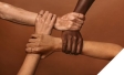 Women of color holding hands