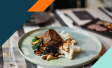 Image of a plate with steak and vegetables