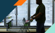 Image of a man pushing a shopping cart 