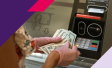 Image of woman taking cash out of an ATM