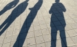 People in shadow