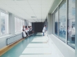 doctors looking through a glass window