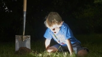 Digging boy finding treasure