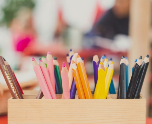 Coloured pencils in wooden box