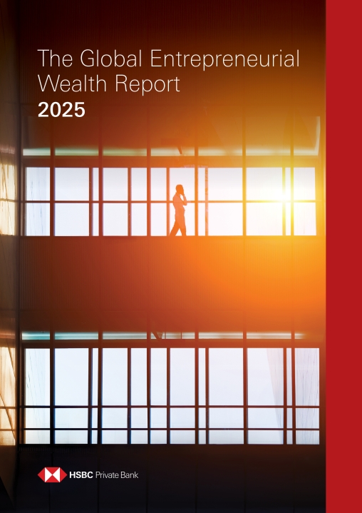 report cover featuring a business man on the phone walking past windows lit by warm orange afternoon light