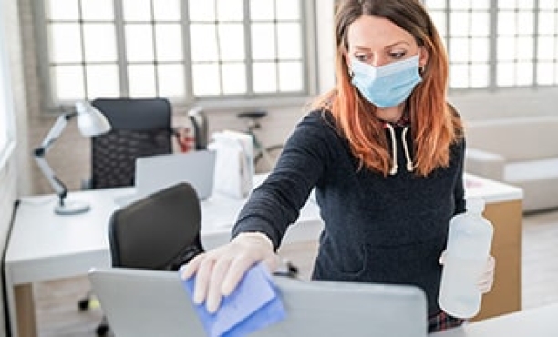 Woman cleaning the office | Covid-19 myths | ESSENTIALS | Ipsos