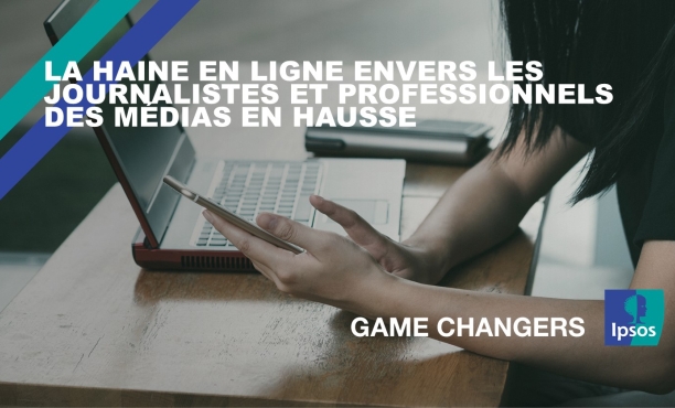 Woman with phone and laptop