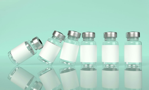 vaccine bottles falling like dominos