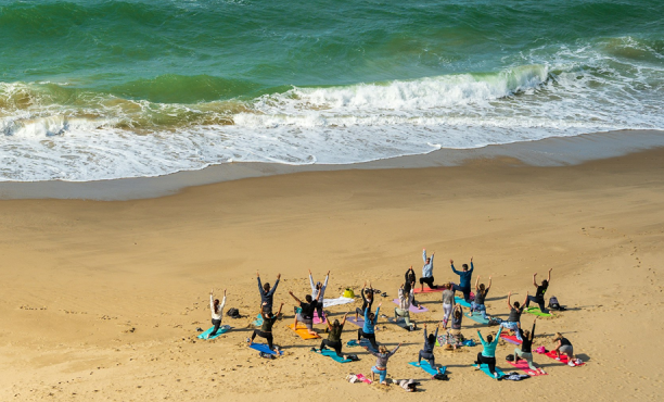 People exercising on beach in bournemouth