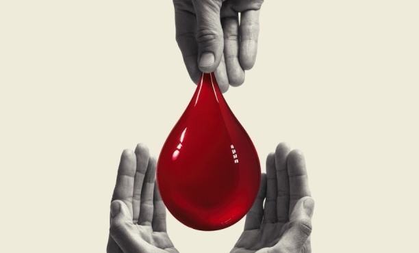 Illustration of a large red blood drop being passed from an upper hand to two cupped hands below, symbolizing blood donation and care.