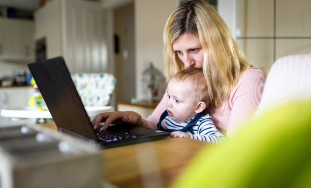 Woman and baby on laptop