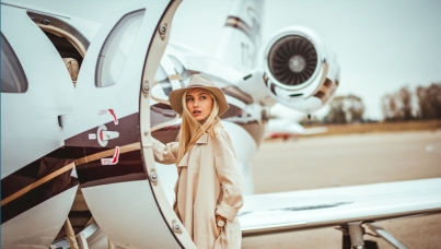 Woman stepping onto a plane