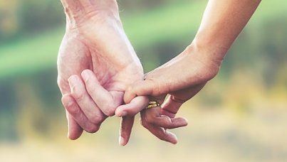 Couple holding hands