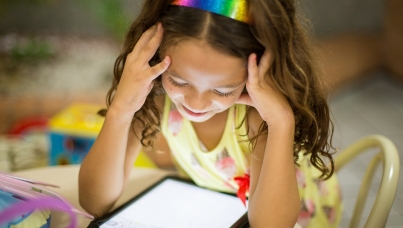 child with tablet