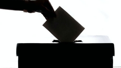Black and white image of vote being cast