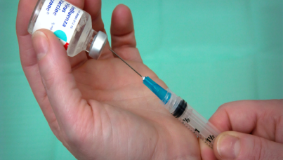 Vial and vaccine