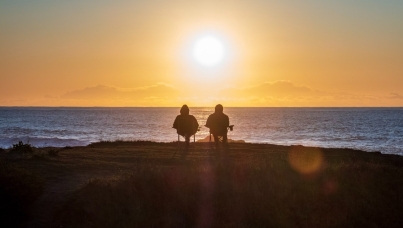 Retired couple at sunset