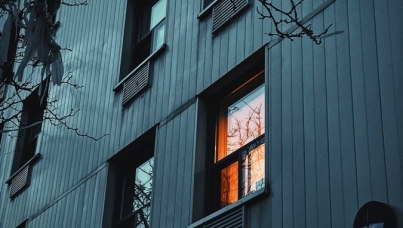 Light on in window of condo building