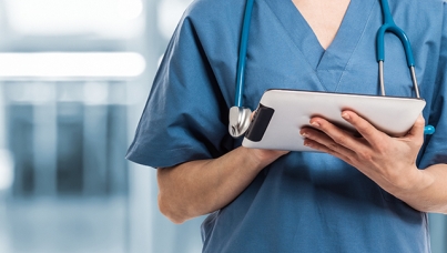 A Doctor holding a clipboard