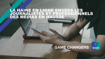 Woman with phone and laptop