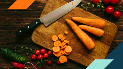 Image of vegetables on cutting board along with a knife