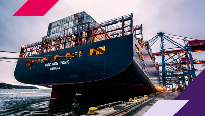 Image of a barge filled with shipping containers